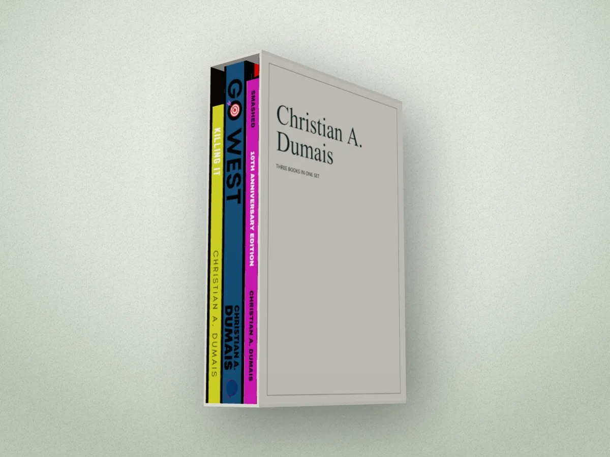 Killing It, Go West and Smashed in a white slipcase with Christian A. Dumais on its face