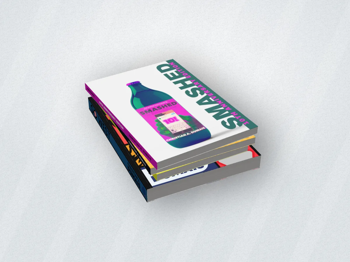 Four books lying in a stack, Smashed on top, on a pale backdrop with window light