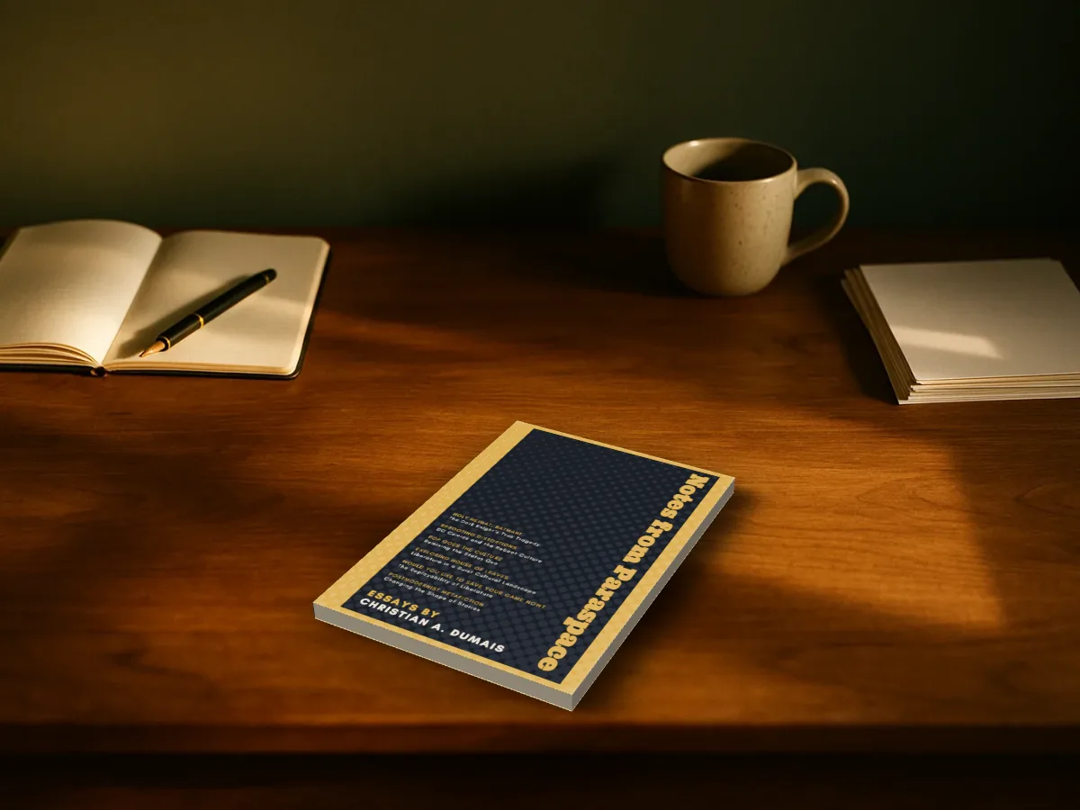 A read copy of Notes from Paraspace lying on a wooden writer's desk with a notebook and a mug
