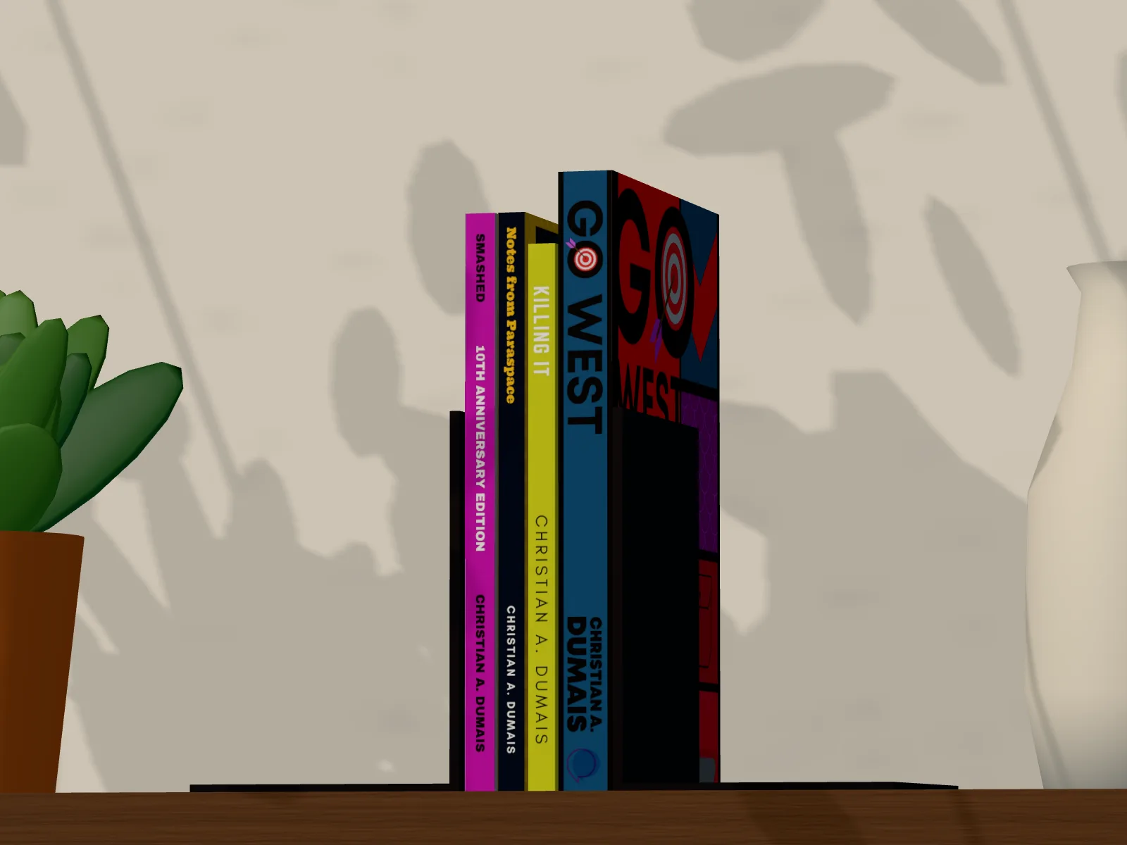 Four of Christian A. Dumais's books spines out between two black bookends on a walnut wall shelf, a plant and a vase either side