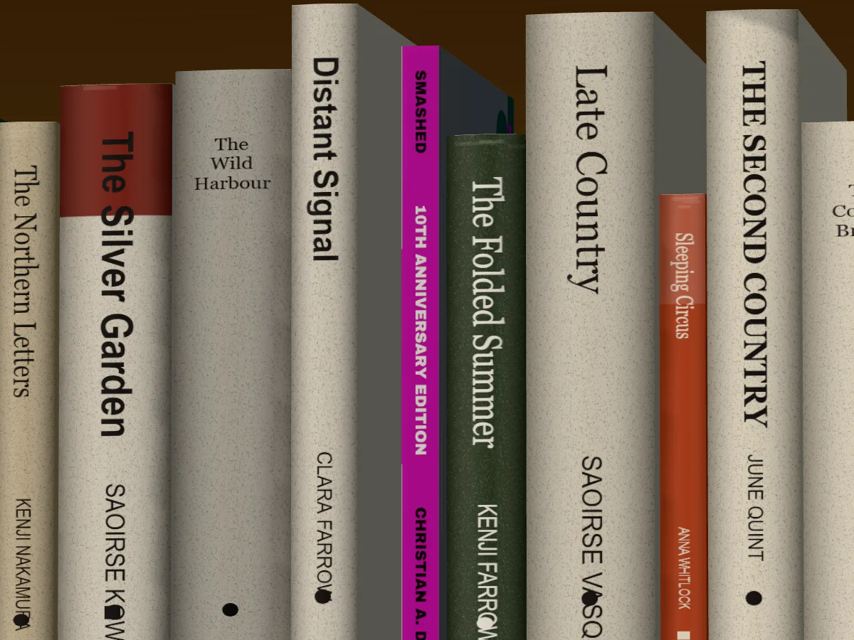 Smashed spine out on an oak library shelf among made-up books, window light falling across