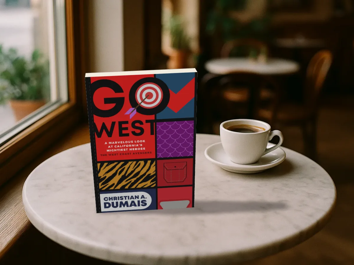 Go West standing on a marble café table next to a cup of coffee